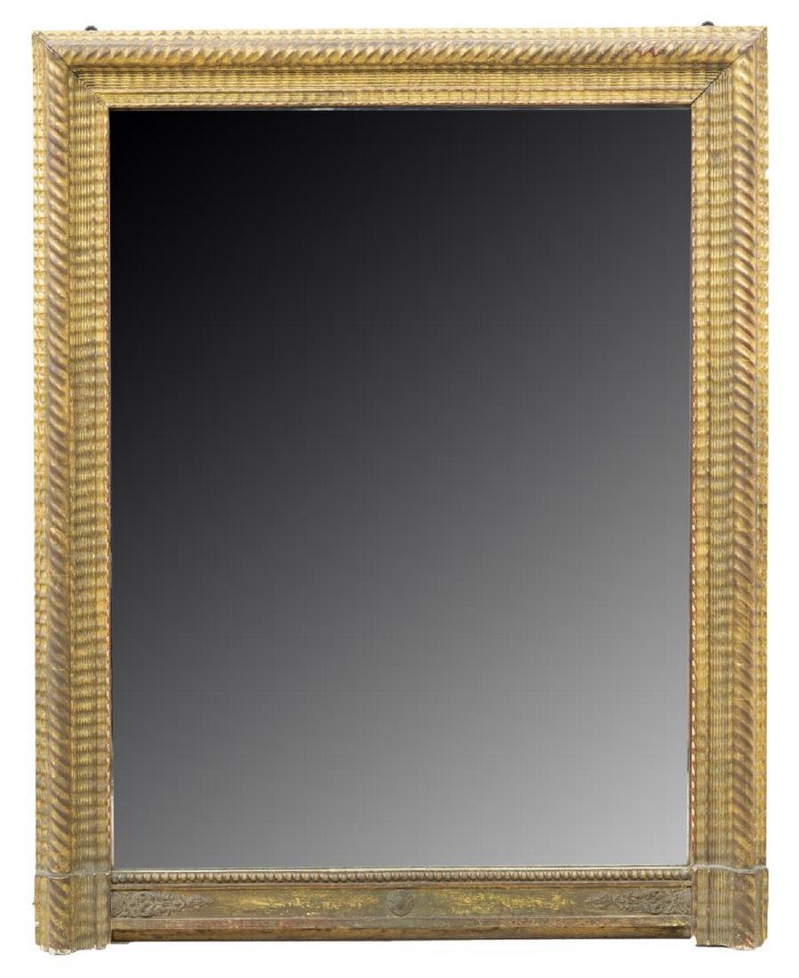 CHARLES X STYLE GILTWOOD WALL MIRROR: Charles X style giltwood wall mirror, having a shaped frame, accented by beading and light carving at bottom, surrounding the flat mirror plate, loss to silvering, approx 51"h, 41.5"w, 59.4lbs Start P