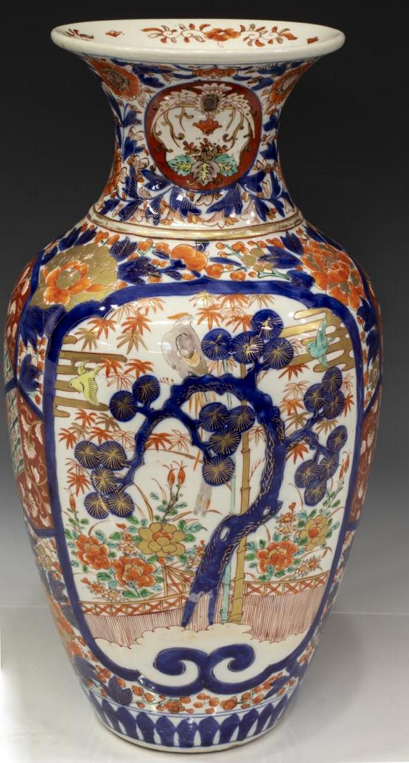 LARGE JAPANESE IMARI PALETTE PORCELAIN VASE: Japanese Imari porcelain vase having parcel gilt accents, reserved to either side with birds and pine trees, overall floral, foliate and diaper decoration, approx 19"h, 10"w, 11lbs **Provenance: From