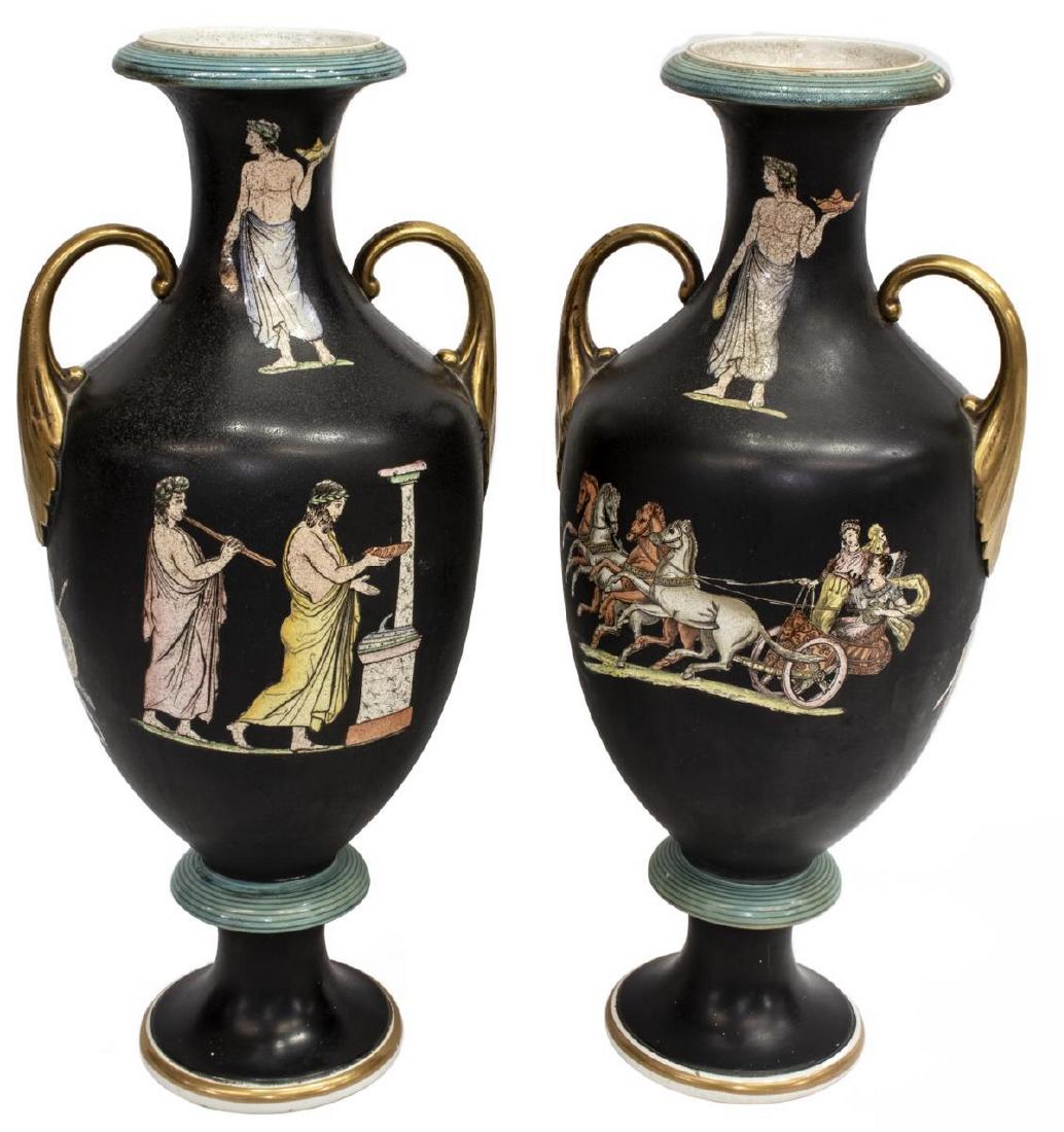 (2) ENGLISH STAFFORDSHIRE NEOCLASSICAL AMPHORA URN: (lot of 2) English Staffordshire neoclassical urns, late 19th c., amphora form, with gilt handles, matte black ground, with transfer decoration of classical figures and chariots, raised on pedestal fo