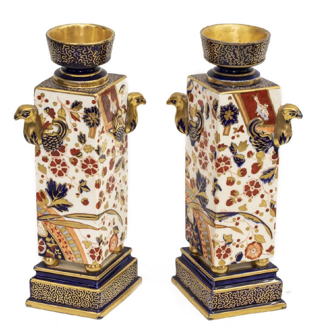 (2) STAFFORDSHIRE RIDGWAYS OLD DERBY GARNITURES: (pair) English Staffordshire garnitures, late 19th c., Old Derby, Ridgways, in the Imari palette, cobalt glazed field with gilt decoration, bird-form handles, canted body with Asian-inspired designs, 