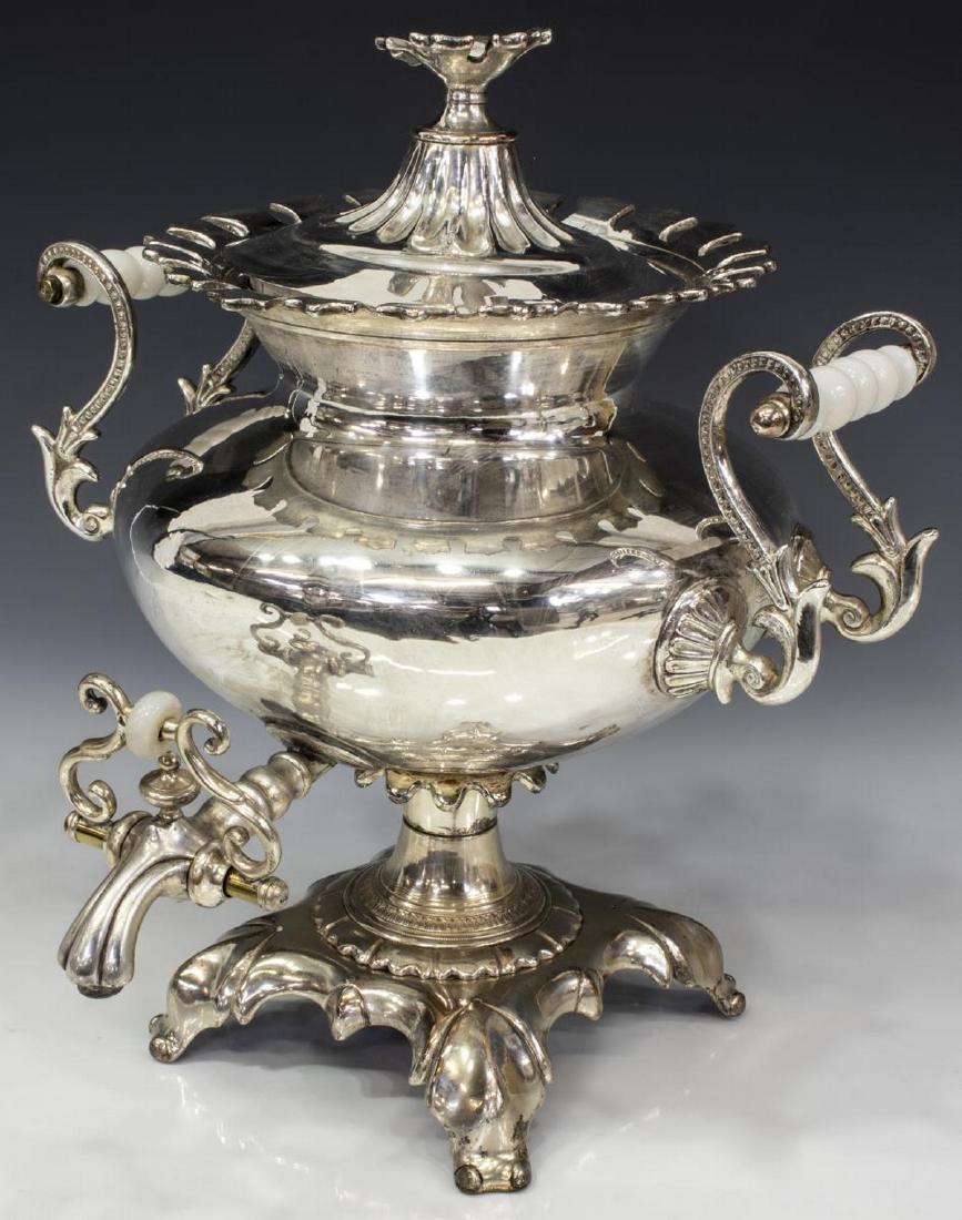 ENGLISH SILVERPLATE LIDDED WATER URN / SAMOVAR: English silverplate lidded water urn, marked to the underside of the lid "Warranted Best London Manufacture," having an urn form with scrolled arms and opaline glass handles, rising on four short, scr