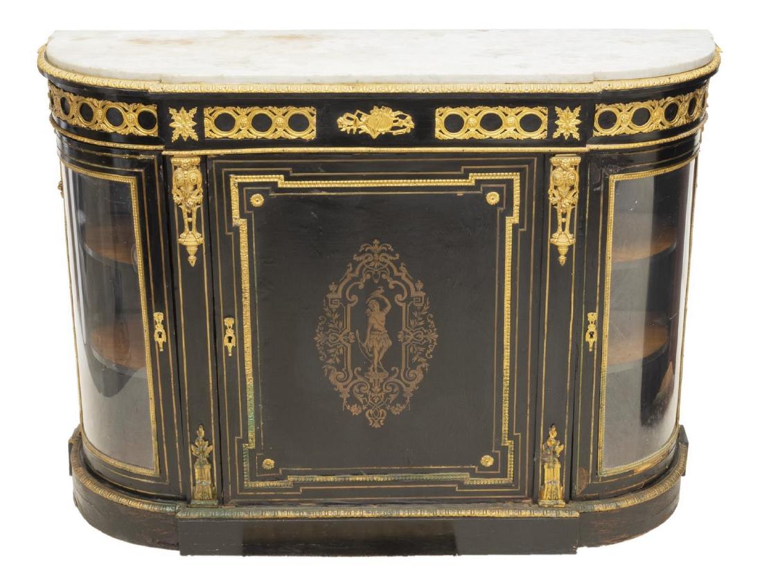 EMPIRE STYLE INLAID EBONIZED CONSOLE CABINET: French Empire style console cabinet, having marble top, over ebonized case, with gilt metal string inlay and ormolu mounts, fitted with three doors, center door with inlaid metal work cartouche of exo