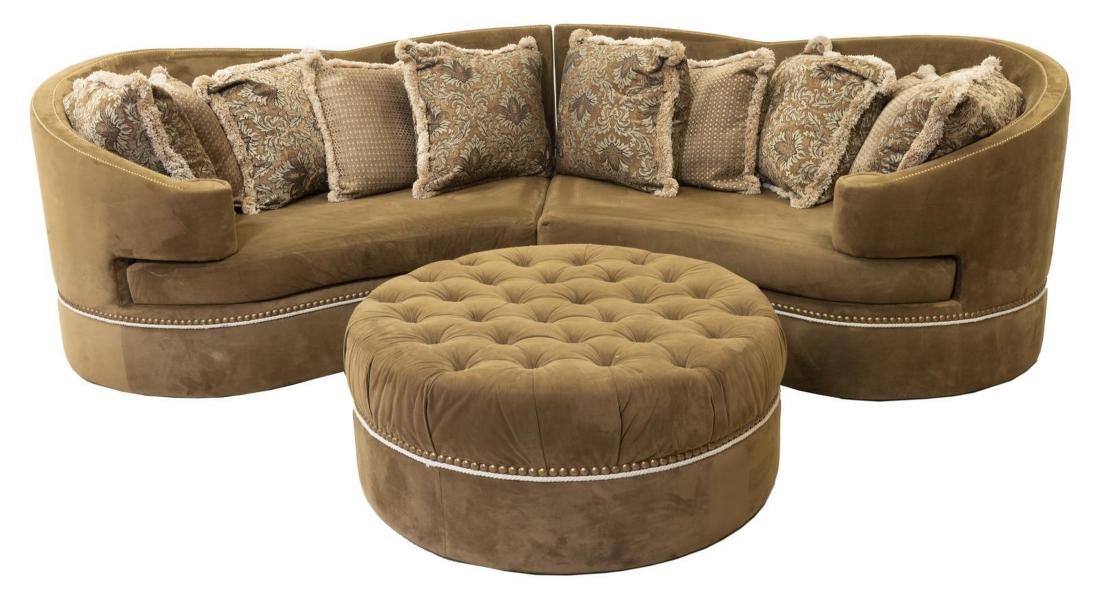 MARGE CARSON (ATTRIB) LARGE CRESCENT SOFA, OTTOMAN: Large crescent-form sofa, attributed to Marge Carson, in brown ultra suede upholstery, with brass tacks and twisted cord trim, tall back with (ten) coordinating throw pillows, cushion seat, in two sec