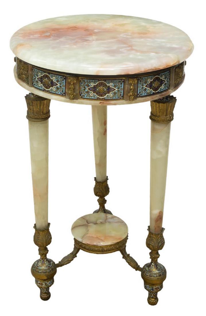 BRONZE-MOUNTED ONYX & CHAMPLEVE GUERIDON TABLE: French Louis XVI style onyx gueridon table, having circular top, frieze with champleve enamel panels, raised on tapering onyx legs with gilt bronze mounts, joined by lower tier, rising on enameled tou