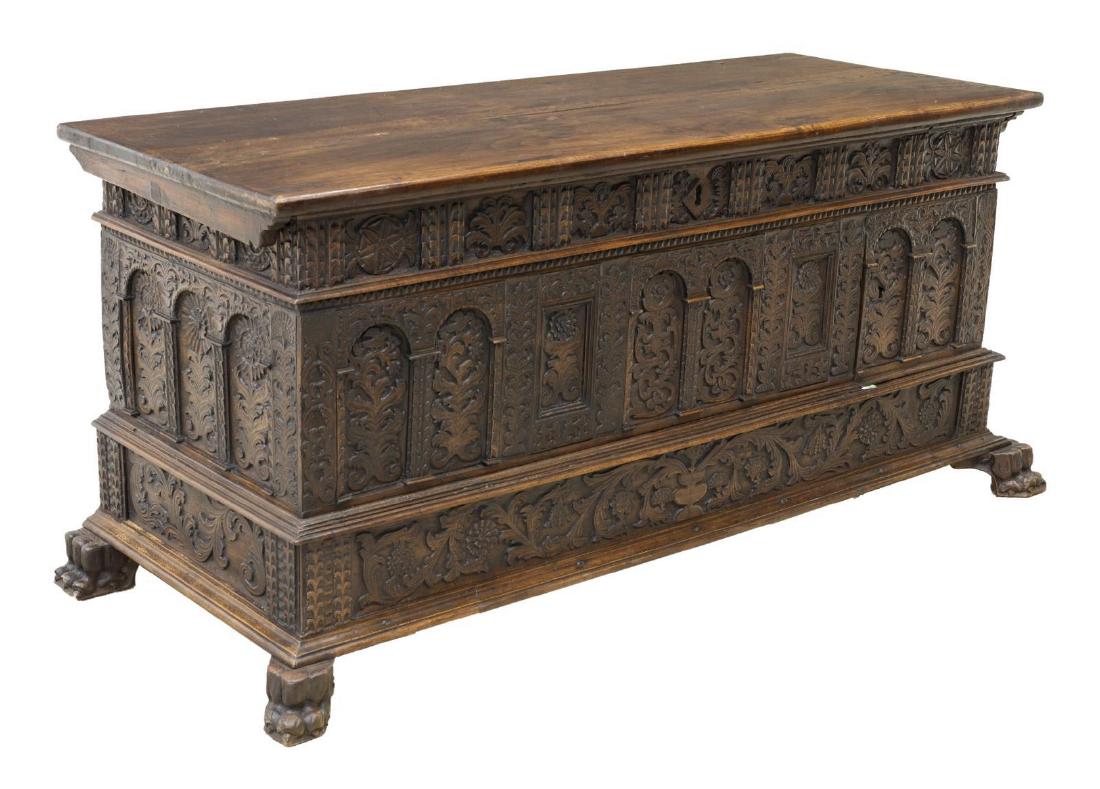 SPANISH CARVED WALNUT WEDDING COFFER 18th C.: Spanish walnut wedding cassone/ coffer, 18th/ 19th c., having hinged top, small door at front right opening to three drawers, front and side panels intricately carved with foliates, floral roundels, a