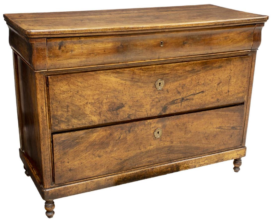 FRENCH CHARLES X WALNUT THREE-DRAWER COMMODE: French Charles X walnut commode, early to mid 19th c., rectangular case, fitted with top ogee drawer, over two additional drawers, rising on turned legs, approx 39.25"h, 53"w, 22.75"d Start Price: $40