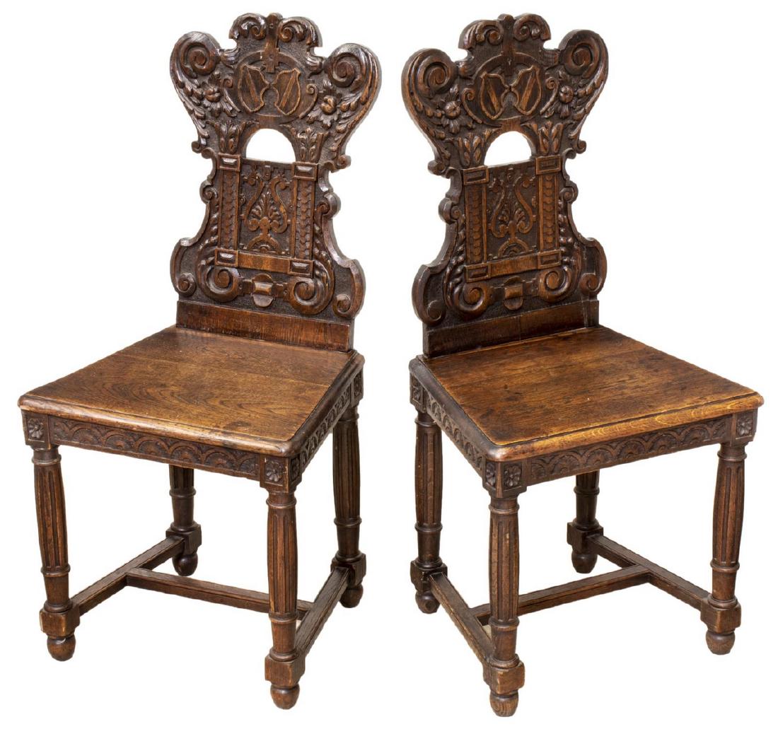 (2) FRENCH RENAISSANCE REVIVAL SIDE CHAIRS: (lot of 2) French Renaissance Revival side chairs, 19th c., the carved frames with harps, foliates, and scrollwork, rising on fluted legs joined by a central stretcher, approx 38"h, 18.5"w, 15"d Start