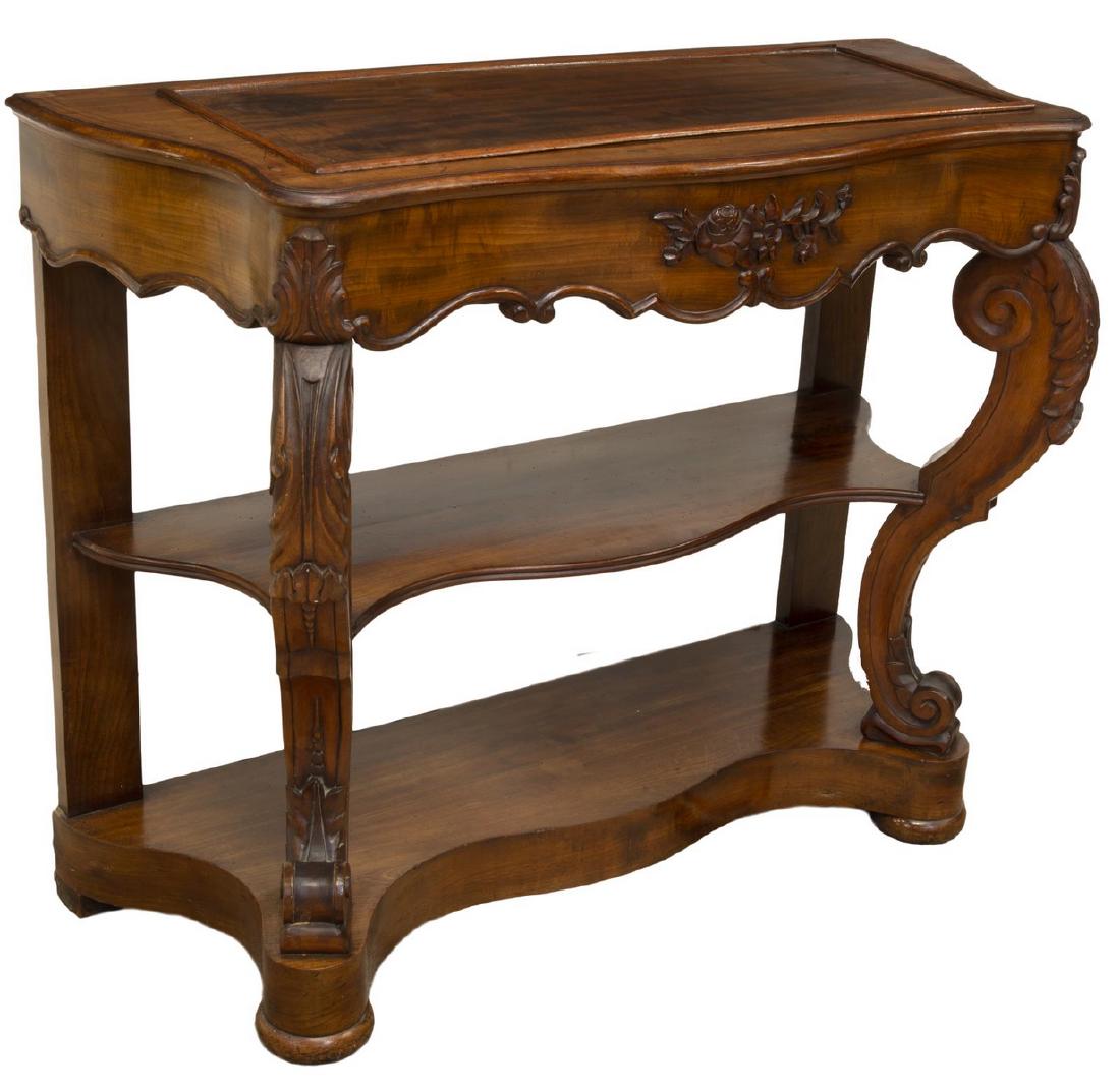 ROCOCO REVIVAL MAHOGANY CONSOLE TABLE: Rococo Revival mahogany console table, late 19th c., demilune form with serpentine front, inset lift top, scalloped apron, foliated volute supports, joined by open shelves, plinth base rising on bun f