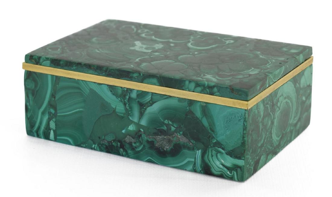 GREEN MALACHITE & GILT METAL TABLE BOX: Malachite desk or table box, 20th c., rectangular form, lift top, gilt metal border, black velvet lined interior bottom, approx 1.5"h, 4"l, 2.65"w, 1lb Start Price: $80.00