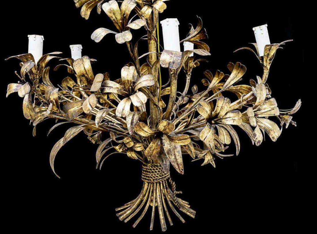 FRENCH MAISON BAGUES STYLE GILT IRON CHANDELIER: French gilt iron five-light chandelier, mid 20th c., in the style of Maison Bagues, in the form of a floral bouquet, with gathered foliates and floral blooms issuing five faux candles, in need of wiri