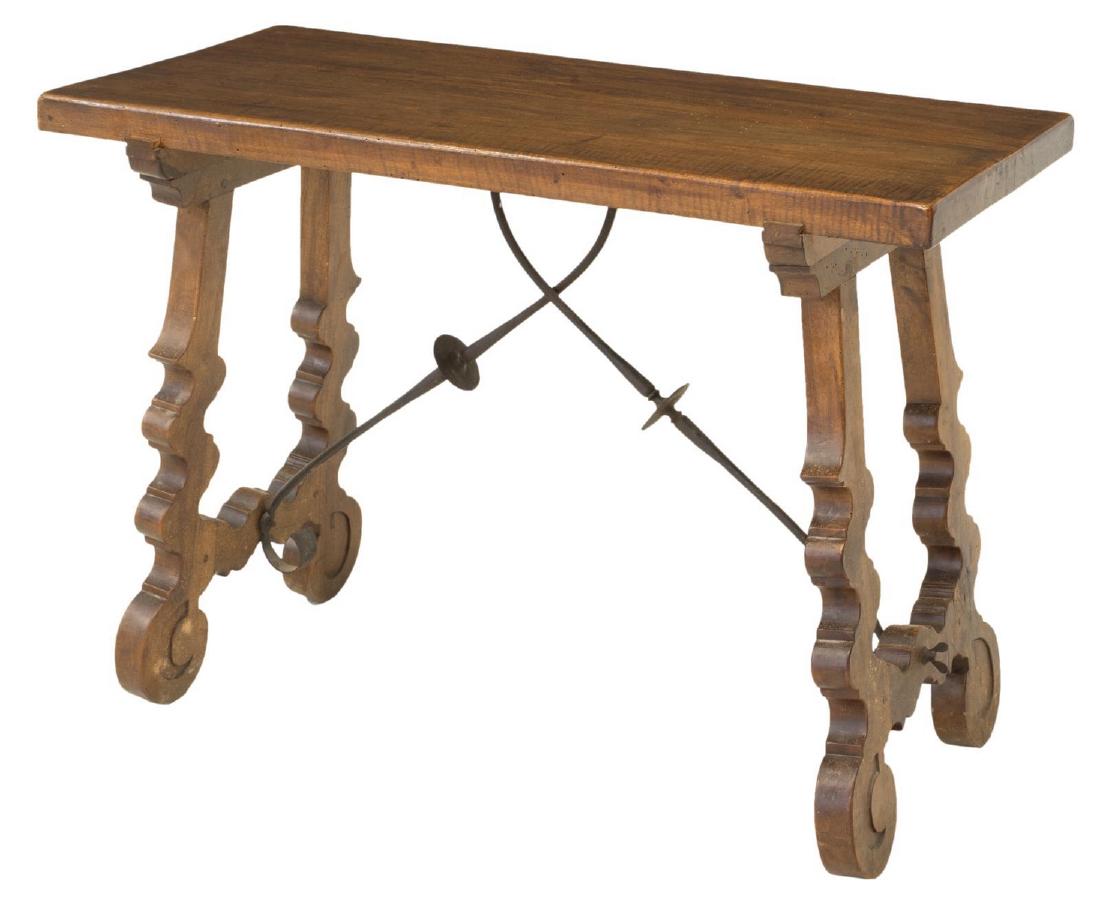 SPANISH BAROQUE STYLE WALNUT FINISH SIDE TABLE: Spanish Baroque style walnut finish side table, early 20th c., having a rectangular top rising on ox yoke supports with scrolled feet, 31"h, 43"w, 19"d Start Price: $200.00