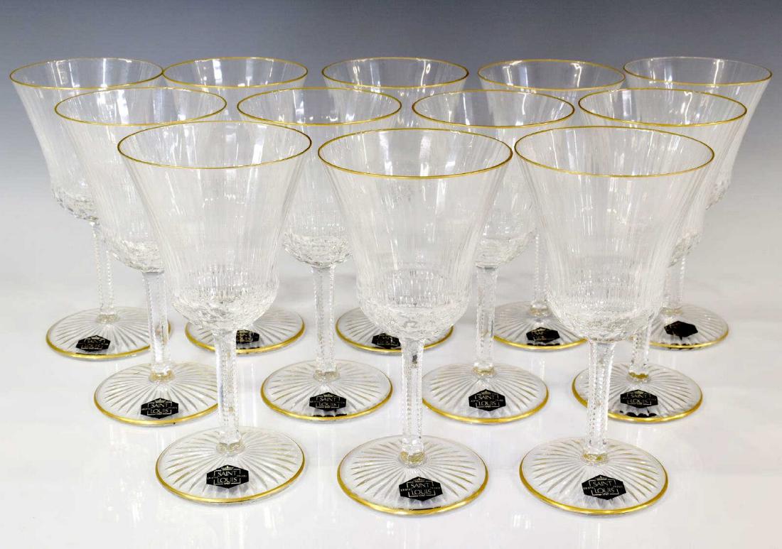 (12) ST. LOUIS CRYSTAL 'APOLLO GOLD' WATER GOBLETS: (lot of 12) Saint Louis Crystal water goblets, France, "Apollo Gold" pattern,contained in original branded boxes (worn), the body and stem with subtle rib design, lip and foot with gold banded highlig