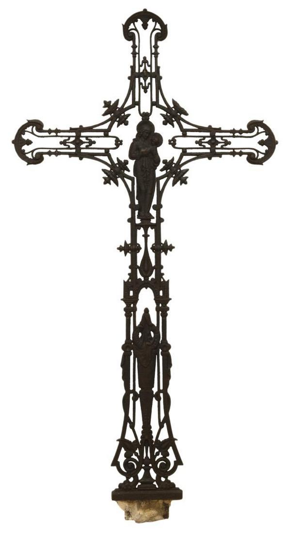CONTINENTAL RELIGIOUS CAST IRON CROSS, 72"H: Continental Gothic Revival religious cast iron cross, openwork framing, centering depiction of the Madonna and child, approx 72"h, 36.75"w Start Price: $150.00