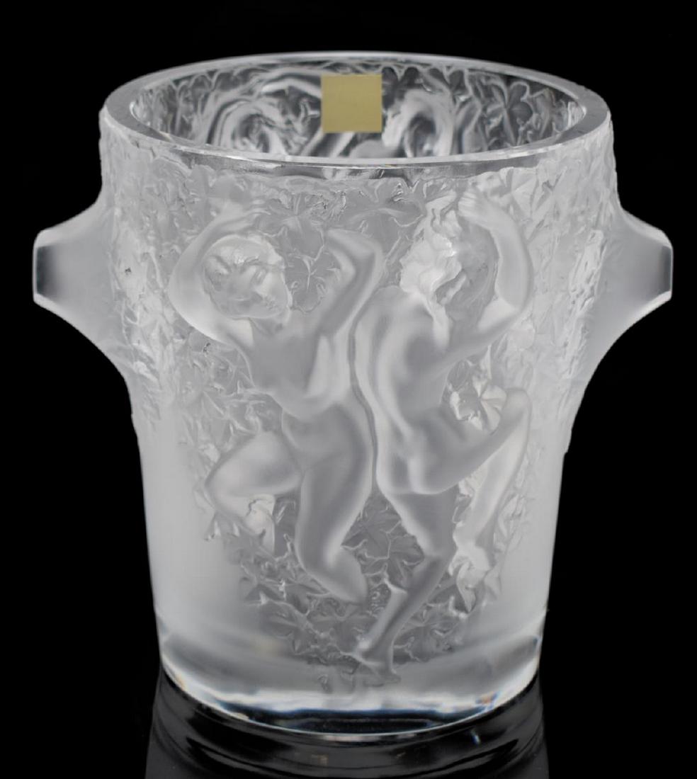 LALIQUE, FRANCE 'GANYMEDE' CRYSTAL ICE BUCKET: Lalique, France "Ganymede" art crystal frosted champagne cooler, two female nude reliefs on either side, depicted in various poses, surrounded by grape leaves, two protruding triangular handles, engra