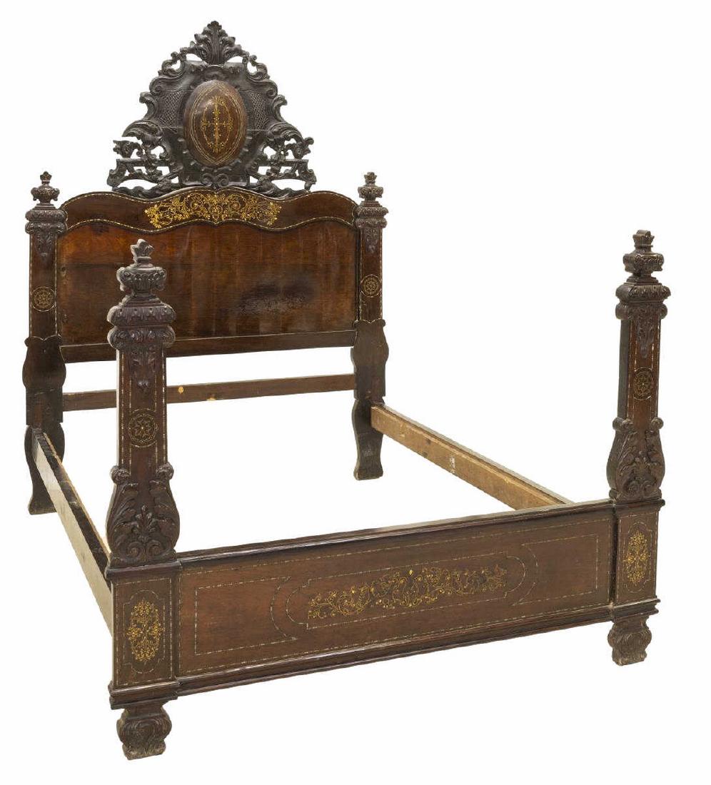 SPANISH FERNANDINO EMPIRE STYLE BOULLE INALID BED: Spanish Fernandino/ Empire style bed, late 19th c., in an ebonized and rosewood finish, carved scrolling foliate crest, centering oval cartouche with Boulle style gilt metal and mother of pearl inlay,