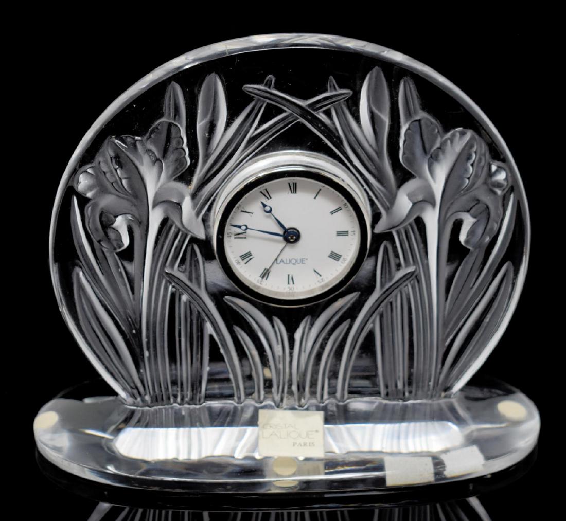 LALIQUE 'IRIS' FROSTED ART CRYSTAL DESK CLOCK: Lalique, France art crystal desk clock, molded and frosted glass with irises in relief, battery operated, engraved signature Lalique France at base, retaining retail and Made in France stickers, appro