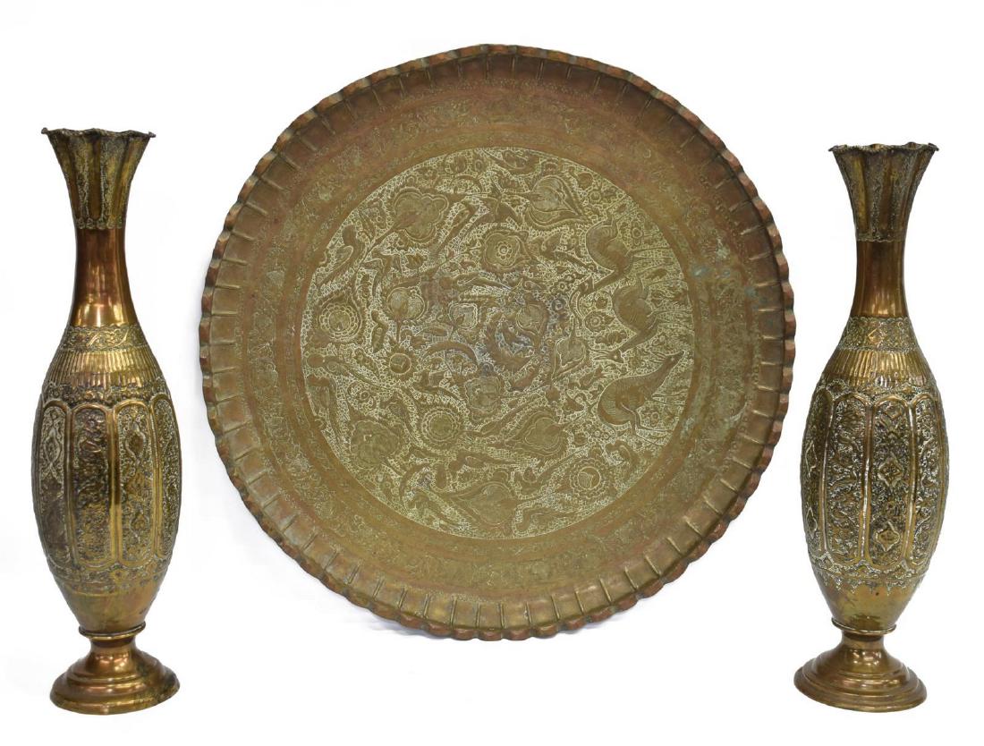 (3) COLLECTION LARGE PERSIAN METAL VASES & TRAY: (lot of 3) Persian worked metal vases and tray, (2) large vases, having scalloped top, decorated with motifs including floral and foliate elements, resting on round foot, approx 22.25"h, 5.75"diam; (1