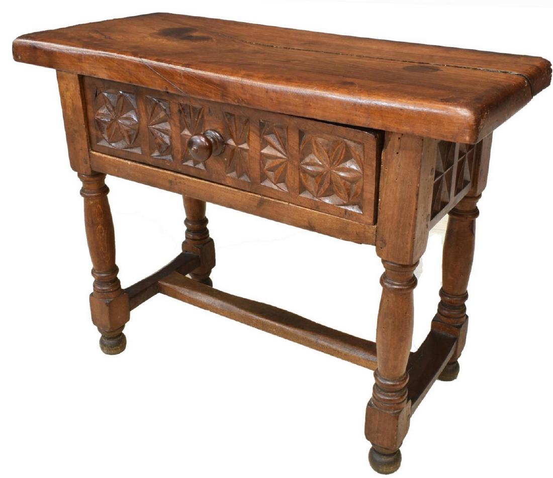 SPANISH CARVED WALNUT CONSOLE, LATE 19TH C.: Spanish walnut console table, late 19th c, rectangular top over center drawer with incised carved spiral designs, rising on scrolled legs joined by H stretcher, approx 21"h, 27"w, 12"d Start Price: $1