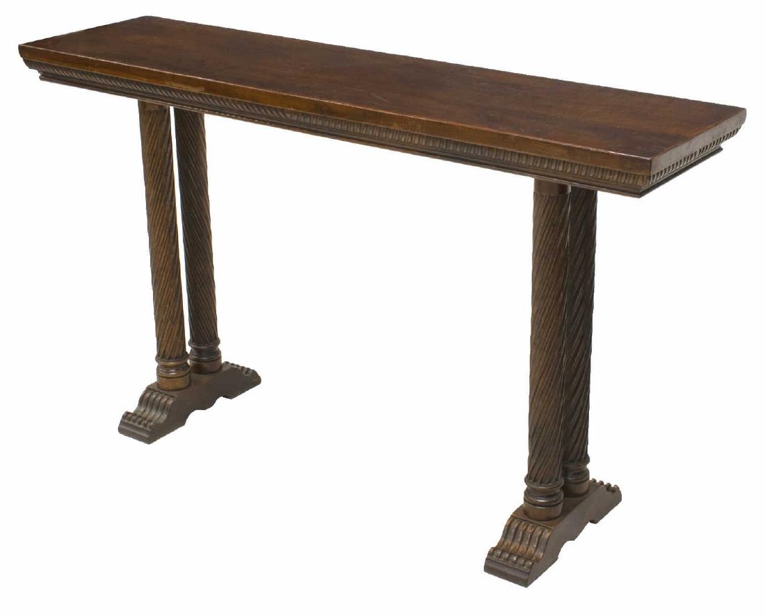 SPANISH WALNUT SPIRALED SUPPORT CONSOLE HALL TABLE: Spanish walnut console hall table, 20th c., narrow top boards, over gadrooned ogee frieze, rising on spiral columnar legs, over trestle base, approx 30"h, 51"w, 13.25"d Start Price: $150.00