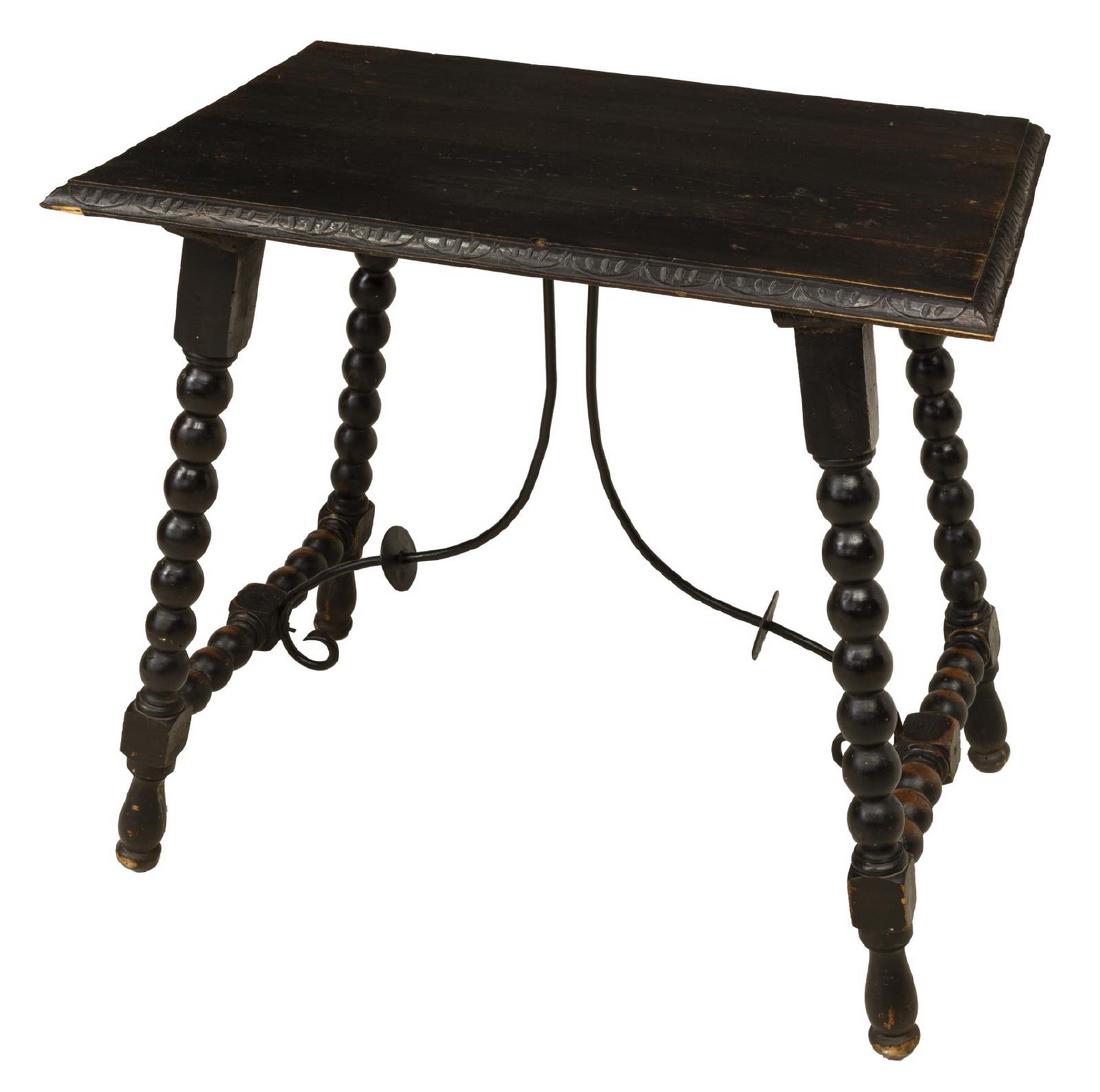 SPANISH BAROQUE STYLE EBONIZED WOOD TABLE, 19TH C.: Spanish Baroque style ebonized wood table, 19th c., having rectangular tabletop with carved acanthus molding to edge, rising on spool and block turned legs, joined by turned side stretchers and scroll