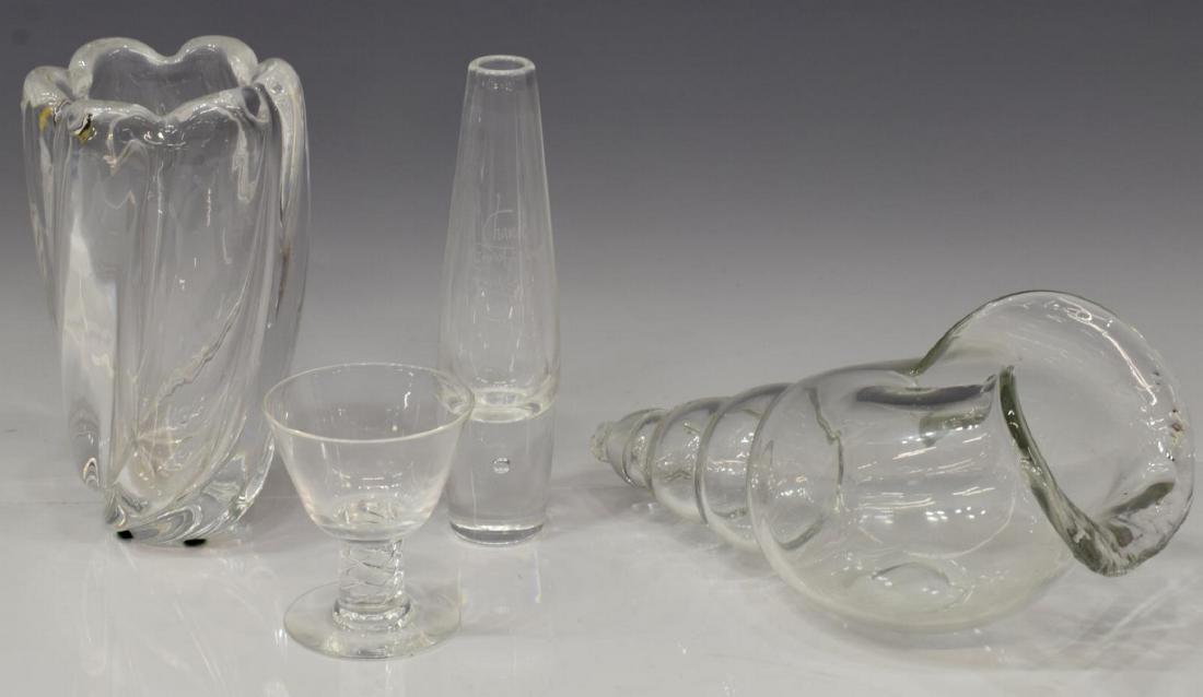 4) STUEBEN COLORLESS ART GLASS & BLOWN GLASS SHELL: (lot of 4) Assortment of colorless glass tableware, comprising: (1) Steuben bud vase with presentation and suspended bubble, (1) Steuben glass with lattice stem, (1) Orrefors "Waterfall" vase, retaini
