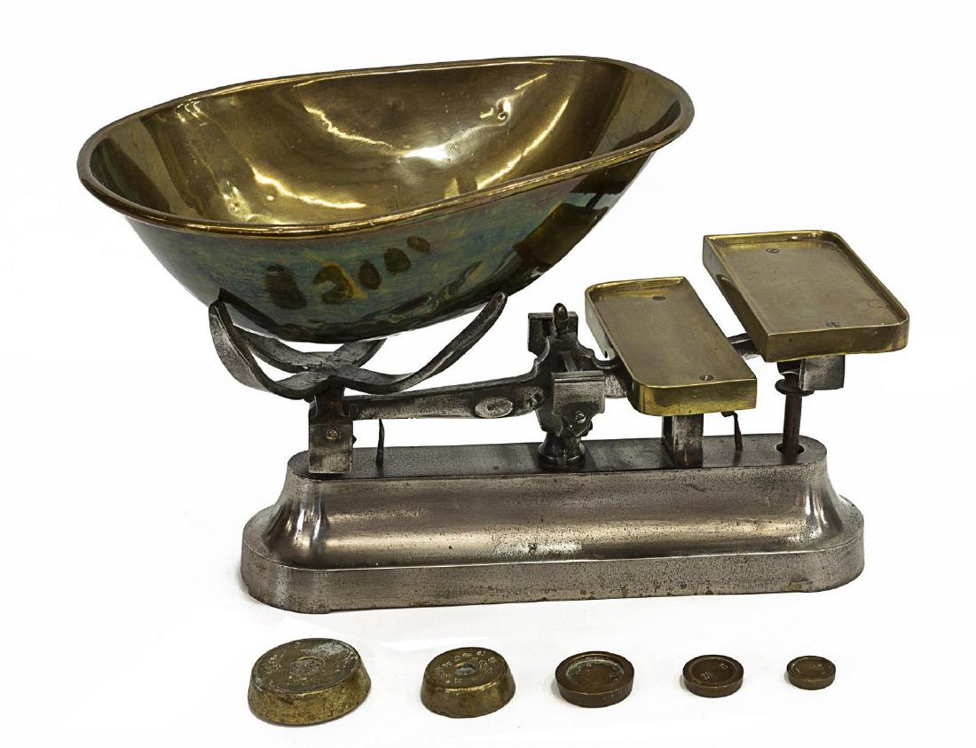 BRITISH IRON & BRASS CANDY BALANCE SCALE: British iron candy balance scale with brass weighing platforms and pan, c. 1900, the beam marked E78, together with five weights, scale: 10"h, 16"w, 7"d, brass pan: 4.5"h, 14"w, 10.25"d, total:16.85lb