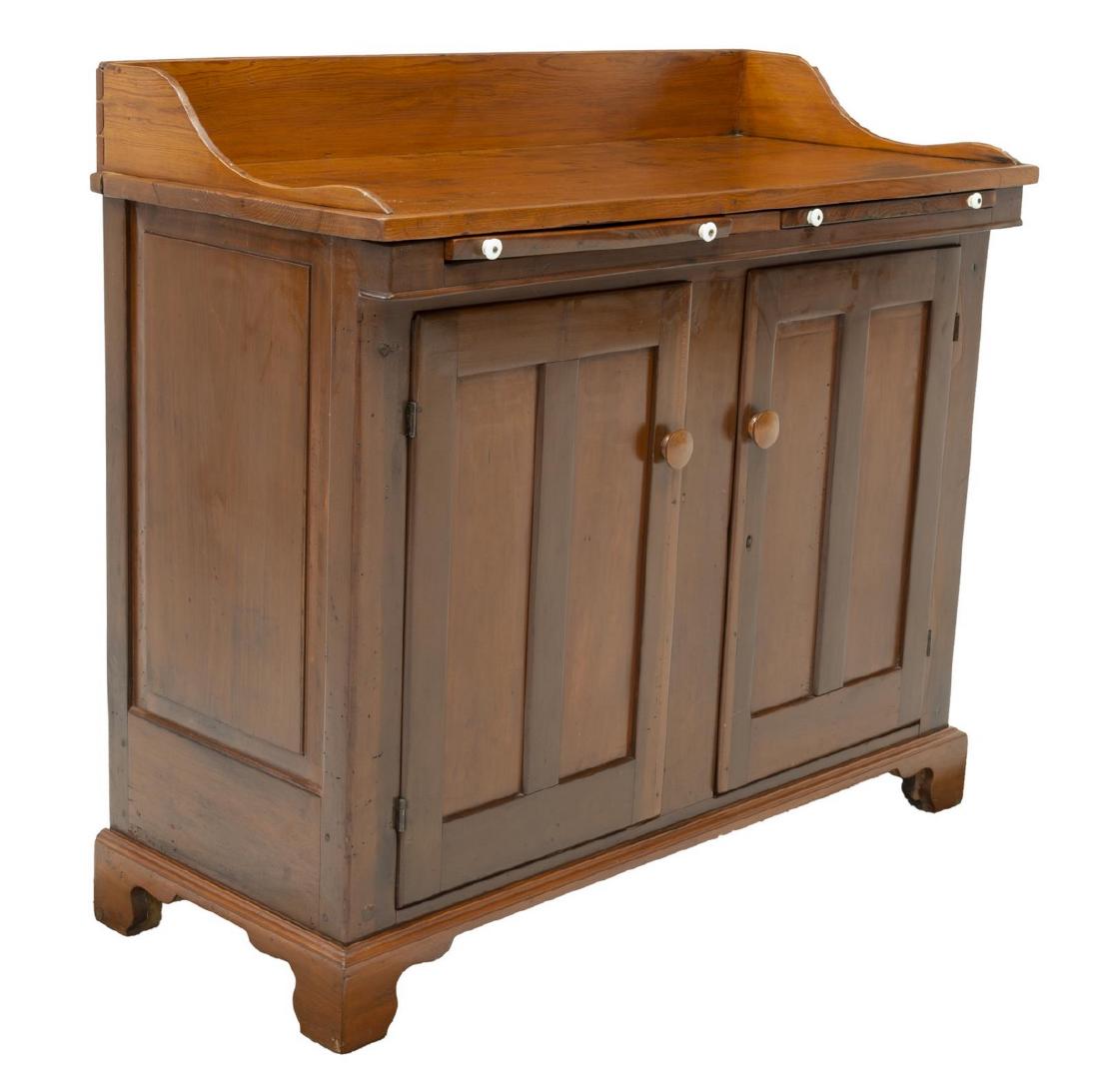 AMERICAN DRY SINK SERVER: American dry sink/ server, 19th/ 20th c., having top with backsplash, two pull out surfaces above single drawer, lower double door cabinet fitted with single shelf, rising on bracket feet to front, ap