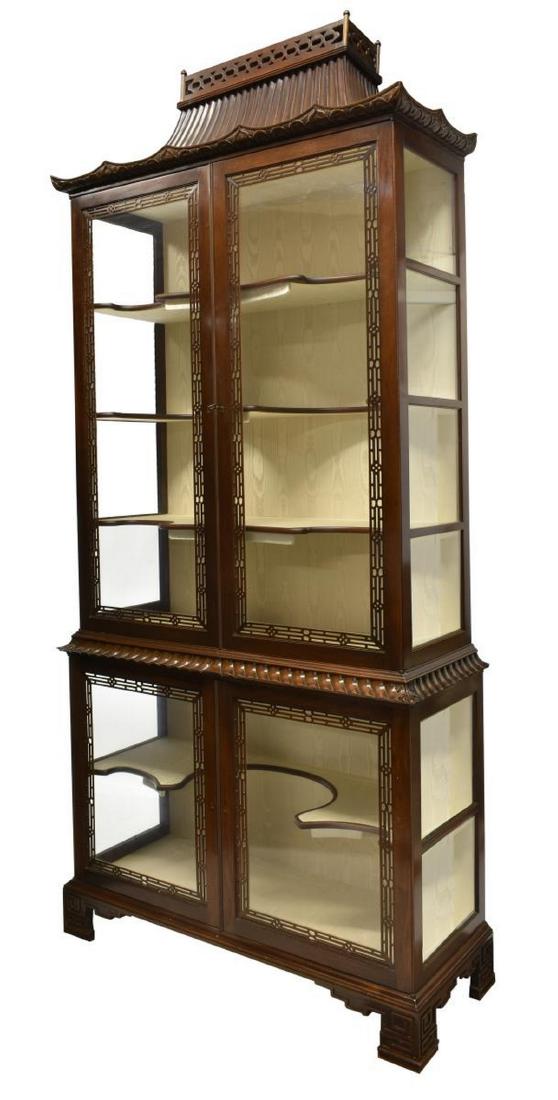 CHINESE CHIPPENDALE STYLE GLAZED DISPLAY CABINET: Chinese Chippendale style display cabinet, late 20th c., in a mahogany finish, having pagoda top over shaped crown, glazed doors and sides, with open fretwork trim, interior lighting, shelves with sil