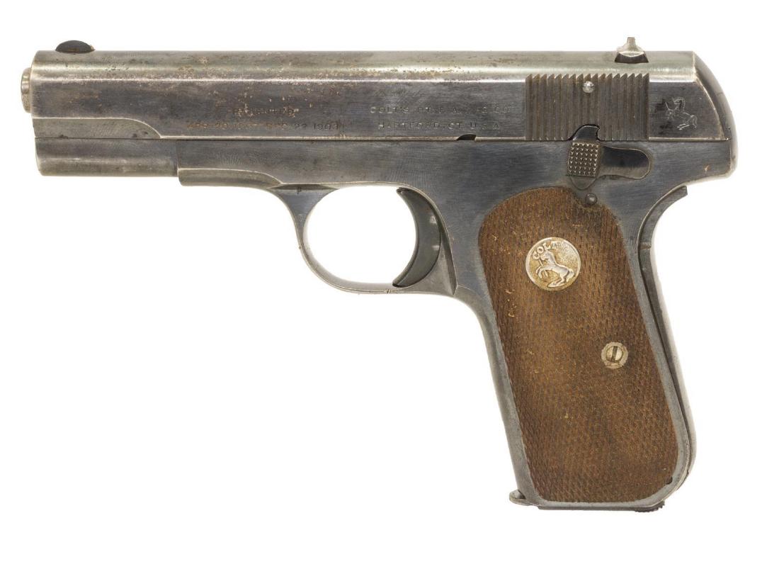 COLT MODEL M HAMMERLESS .380 CALIBER PISTOL: Colt Model M Hammerless 380 Pocket Automatic Pistol, .380 caliber, 2nd Type, 3.75"barrel, checkered walnut rubber grips with rampant colt, Colt seven round magazine, marked at right slide on two lines