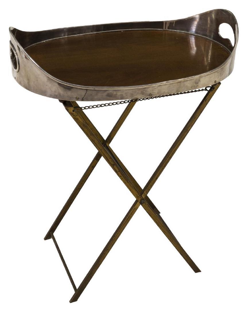 FOLDING TEA TABLE WITH ALMAZAN SILVERPLATED TRAY: Folding tea table, 20th c., removable tray with silverplate sides, open handles, wood base in mahogany finish, on gilt metal folding stand, tray marked Almazan, approx 29.5"h, 22"w, 10"d Start Price: 