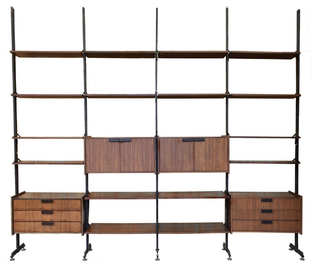 ITALIAN MID-CENTURY MODERN TEAK MODULAR WALL UNIT: Italian mid-century modern teak modular wall unit, c. 1950s, divided into four modules, with sixteen shelves, six drawers and two double-door cabinets, each fitted with single shelf to interior, suppo