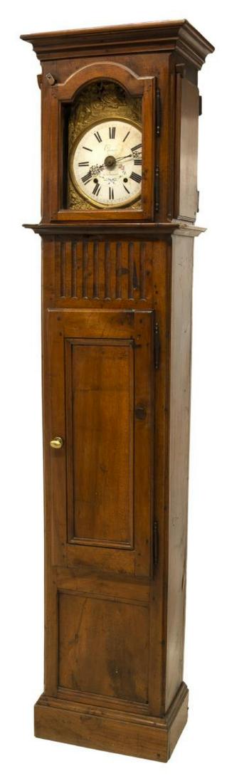 FRENCH MORBIER STANDING WALNUT LONG CASE CLOCK: French Provincial morbier standing long case clock, having gilt metal repousse frame, with figural crest of children on swing, centering white enamel dial with black roman numerals, signed Thomas a Sa