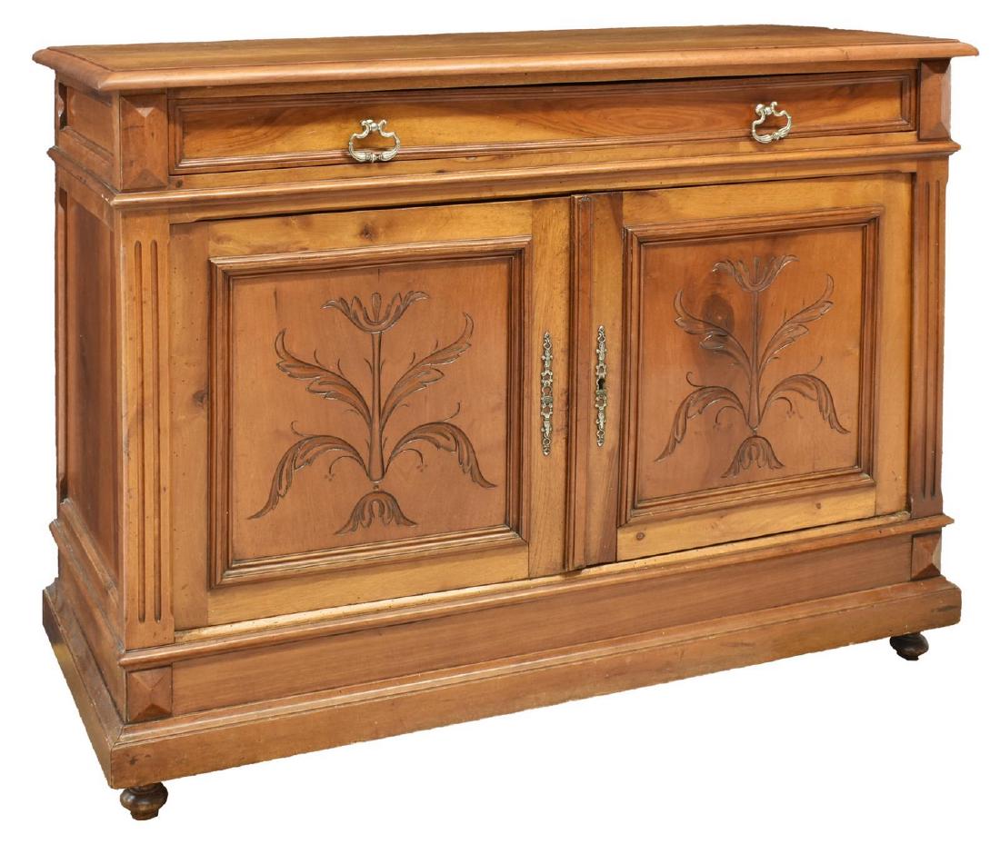 FRENCH HENRI II STYLE WALNUT BUFFET SERVER: French Henri II style walnut buffet, late 19th c., having fluted pilasters and foliate carved accents, single drawer above double-door cabinet fitted with single shelf, drawer later sectioned, approx 