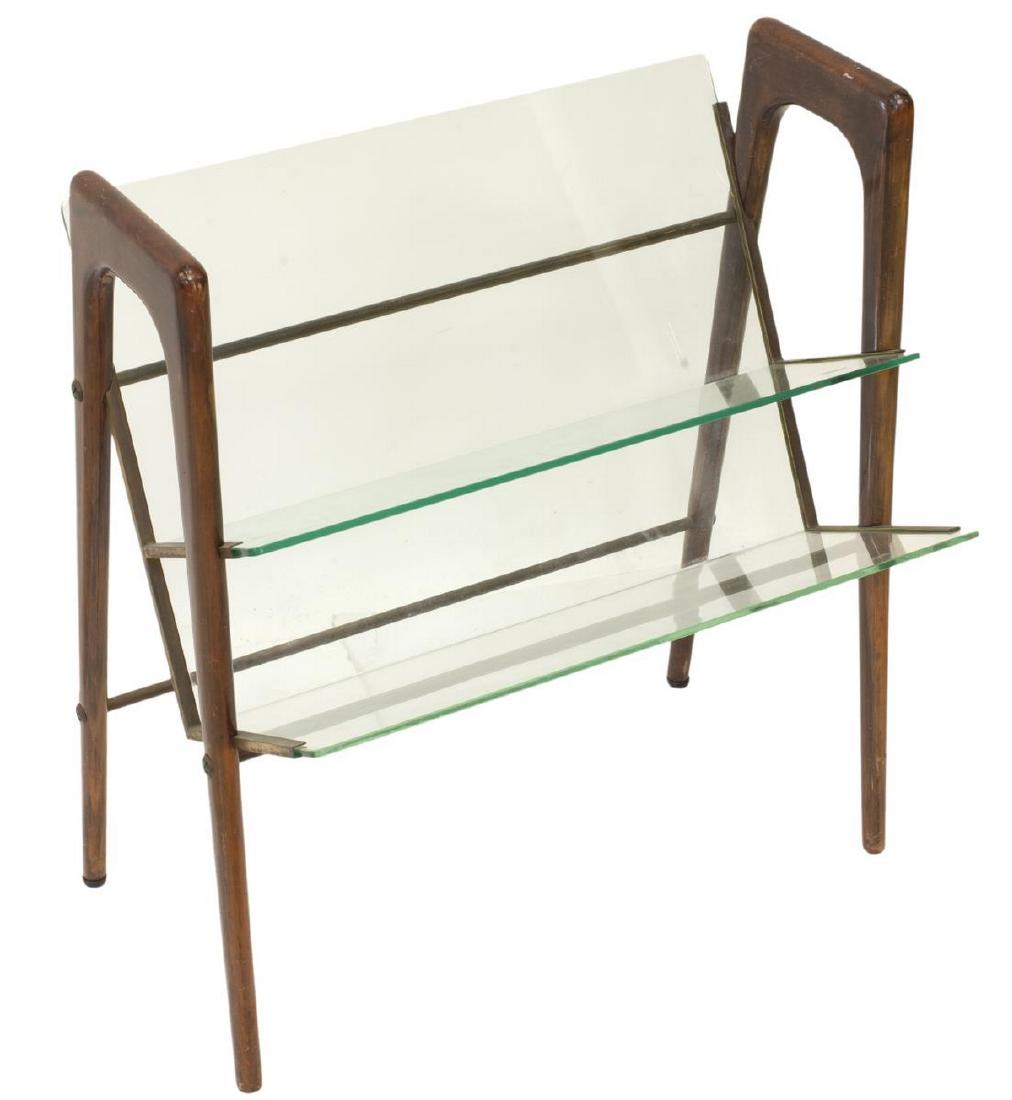 ITALIAN MID-CENTURY MAGAZINE RACK MANNER OF PARISI: Italian mid-century modern magazine rack, c. 1950s-1960s, in the manner of Ico Parisi (Italy, 1916-1996), having stylized angled supports, with two tiers of glass shelves, approx 23.75"h, 21.5"w, 13"d