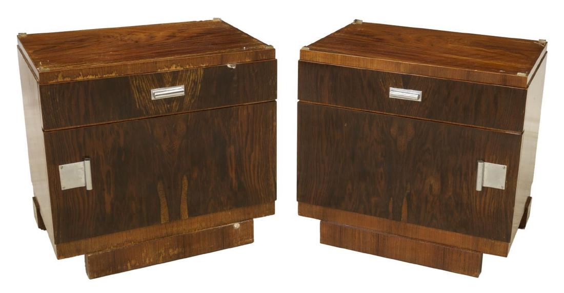 (2) FRENCH ART DECO ROSEWOOD NIGHTSTANDS: (pair) French Art Deco rosewood nightstands, c. 1930s, case fitted with single drawer over cabinet, with stylized chromed metal hardware, front plinth base, approx 21"h, 22"w, 16.5"d Start Price: $150