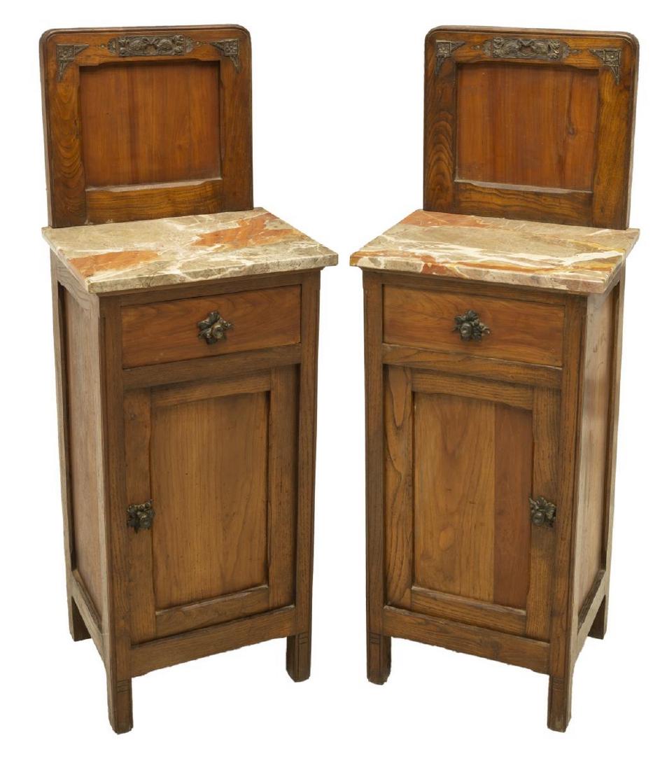 (2) FRENCH ART NOUVEAU MARBLE-TOP OAK NIGHTSTANDS: (lot of 2) French Art Nouveau oak bedside cabinets, late 19thc, having raised backsplash with metal inlay depicting two birds, marble top, lower case fitted with single drawer, over cabinet opening to