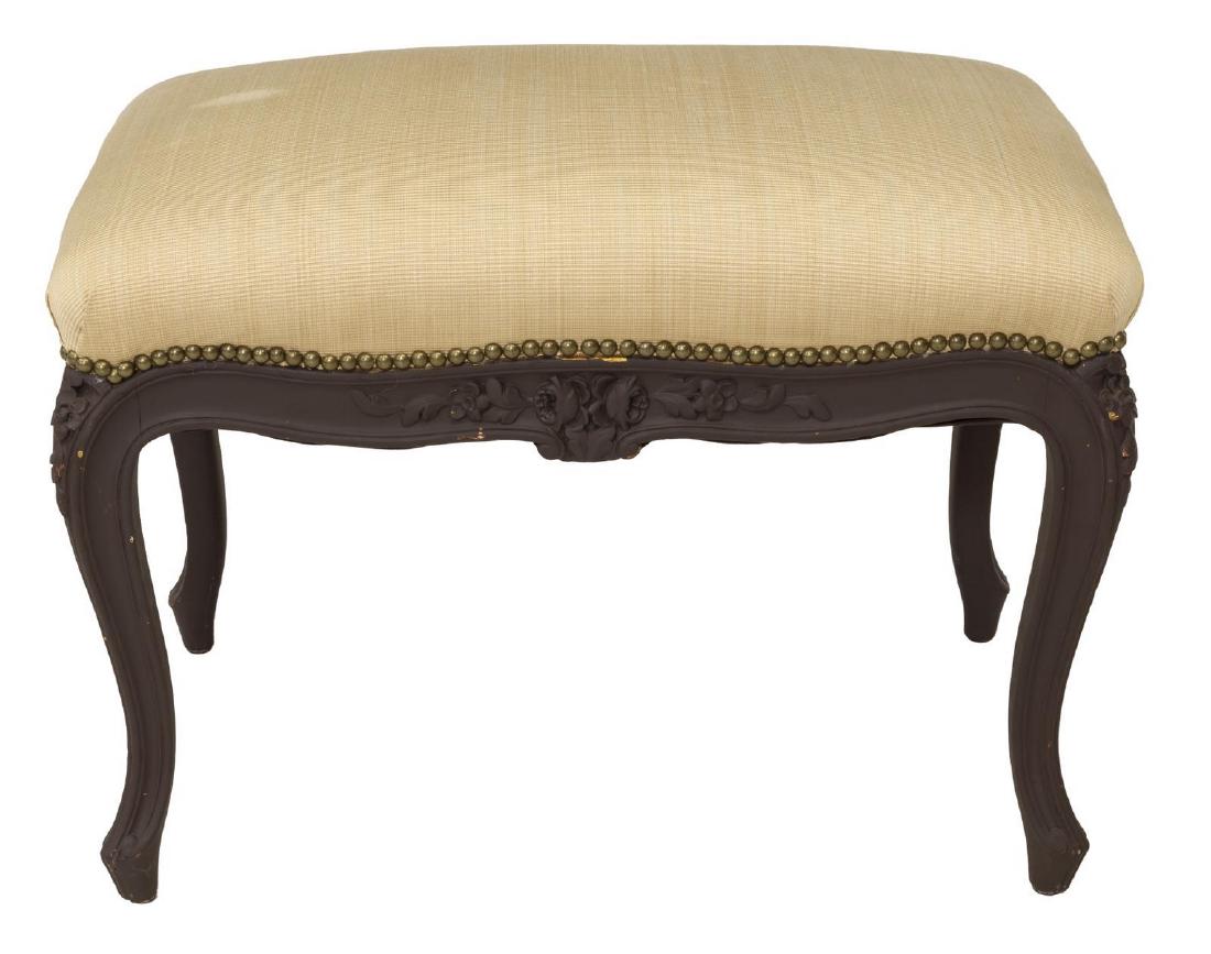 LOUIS XV STYLE UPHOLSTERED BENCH / STOOL: Louis XV style footstool/ bench, 20th c., the upholstered top with nail head accents and a carved floral apron, rising on cabriole legs, approx 20"h, 26"w, 15.5"d Start Price: $60.00