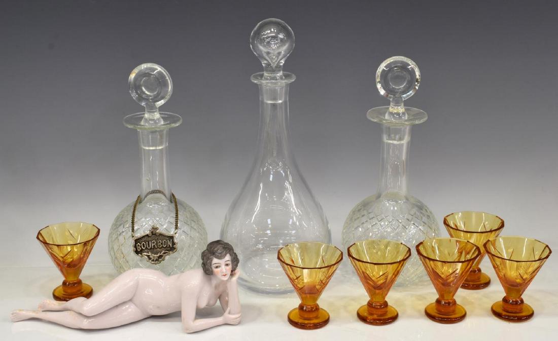 10) DECO & VINTAGE CRYSTAL AND PORCELAIN TABLEWARE: (lot 10) Assortment of tableware and cabinet items, comprising: (6) amber cut crystal stemware in a foliate pattern, chips, (3) crystal decanters, two having a diamond pattern, (1) painted porcelain r