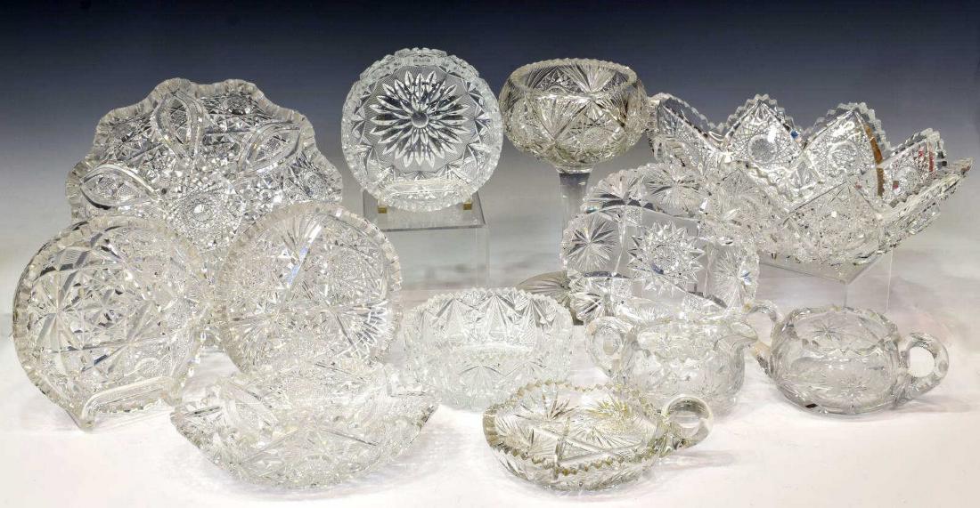 (12) COLLECTION PRESS MOLDED & CUT GLASS TABLEWARE: (lot of 12) Large collection of press molded and cut glass tableware, highlights include: (2 piece) creamer and sugar set, with cut floral motif, (1) goblet, with hobstar pattern, on tall pedestal foo