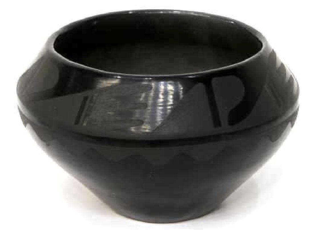 MARIE MARTINEZ BLACK BLACK ON BLACK BOWL 4" x 6.5": San Ildefonso Pueblo, New Mexico, black decoration on black pottery bowl, signed at under side Marie (Maria Martinez, 1887-1980), 4"h, 6.5"diam, 1.5lbs Start Price: $800.00