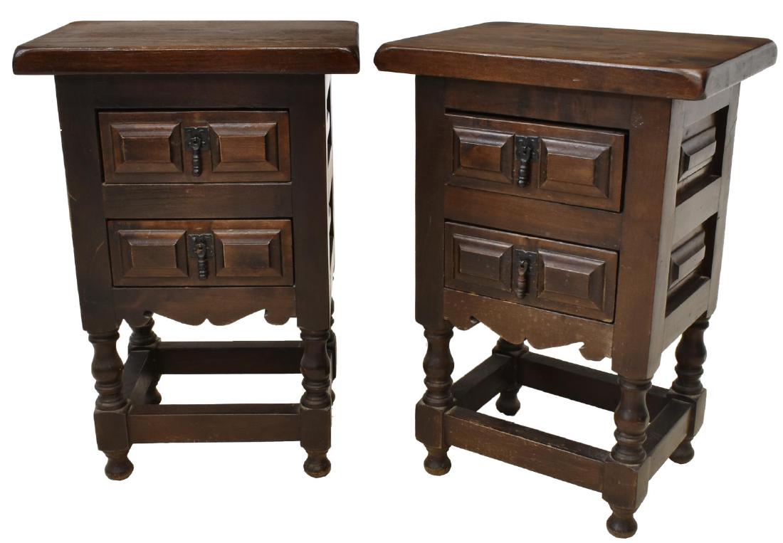 (PAIR) SPANISH LOW SIDE TABLES NIGHTSTANDS: (pair) Spanish low side tables/ stands, 20th c., in a walnut finish, overhanging rectangular top, over case fitted with two drawers, paneled drawer fronts and sides, rising on turned legs, joined by b