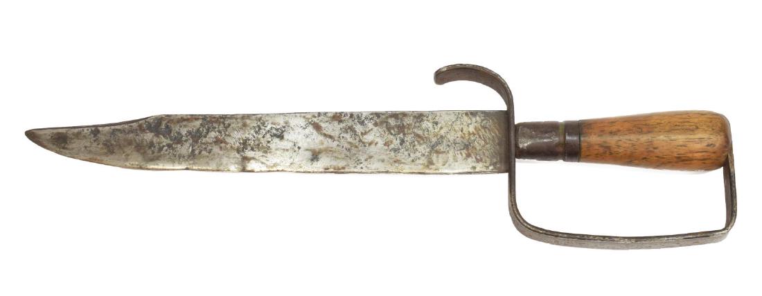 CONFEDERATE D GUARD BOWIE KNIFE: Confederate D guard Bowie knife having a 11.25" clipped point blade, curved quillon, steel ferrule, the pommel end of the knuckle bow guard attached by rivet at the tapered hardwood grip, no visible m