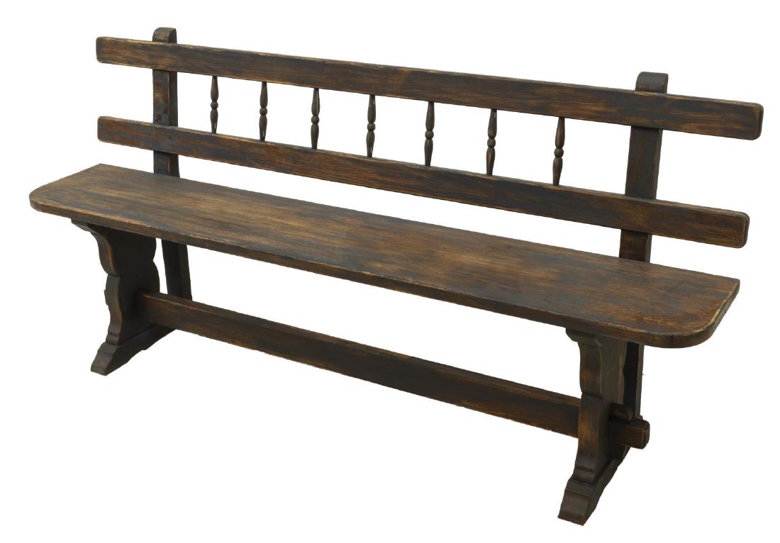 RUSTIC PAINTED LONG BENCH ON TRESTLE BASE: Rustic long bench, in an intentionally weathered painted finish, back with gallery of turned spindles, long plank seat, rising on trestle base, center stretcher displays wedged through tenon construct