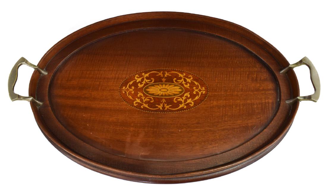 MANNING BOWMAN MAHOGANY MARQUETRY SERVICE TRAY: Manning Bowman mahogany tray, having inset glass above the tray accented by floral and foliate marquetry inlay, dual metal handles, retaining maker's tags, approx 20.5"l, 13"w, 3lbs **Provenance- From