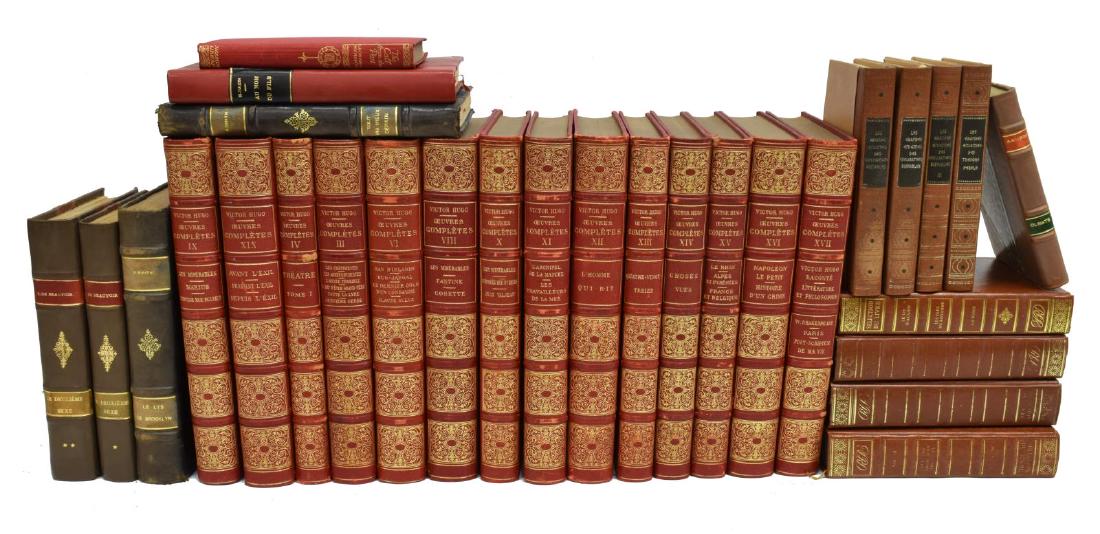 (29) FRENCH LIBRARY SHELF BOOKS: (lot of 29) French library shelf books, 20th c., some with leather binding, with gilt embossed spines, with color illustration, with marbalized boards, including partial series of Oeuvres Completes, (