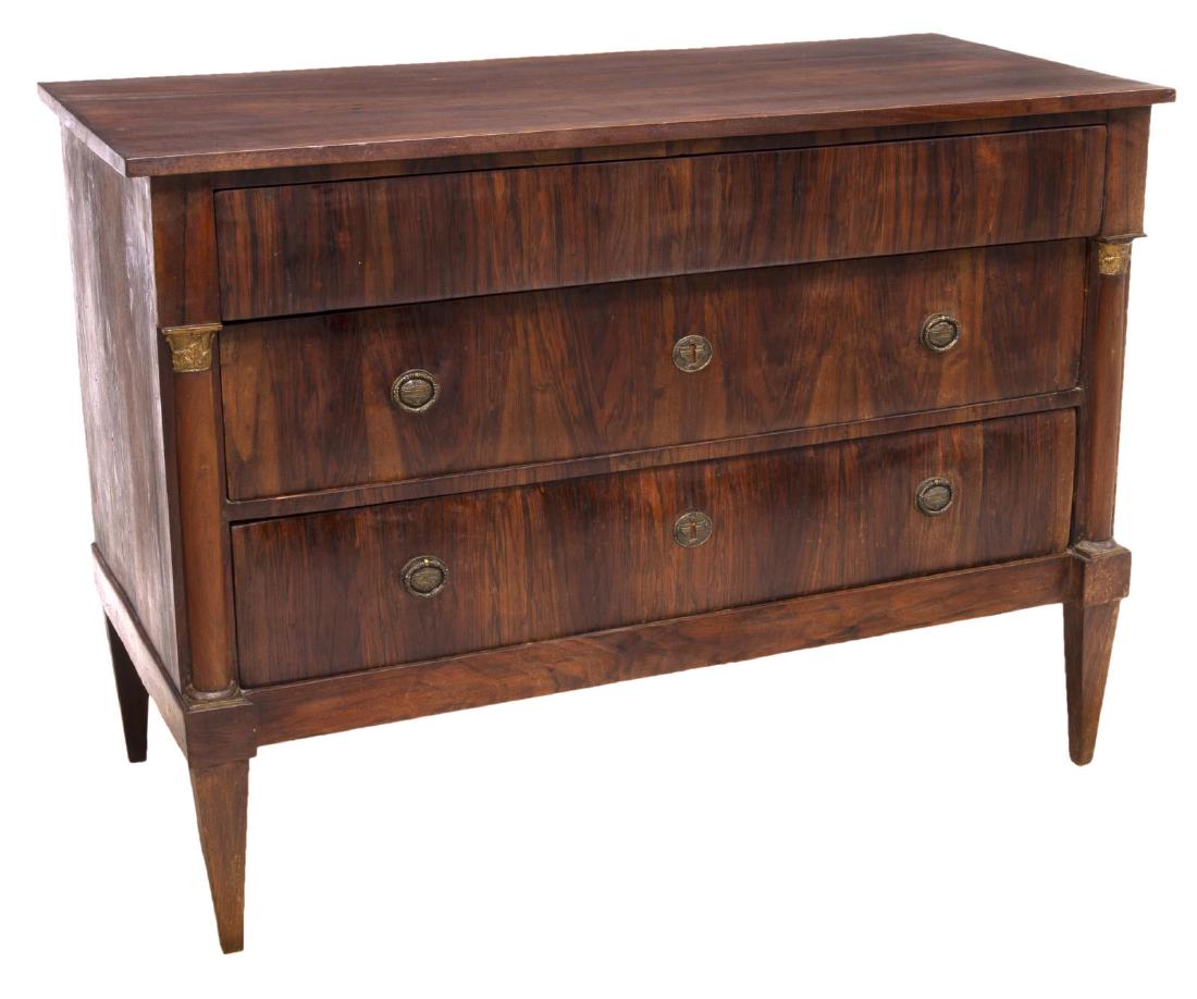 FRENCH EMPIRE FIGURED COMMODE, EARLY 19TH C.: French Empire figured commode, early 19th c., having three drawers, giltwood accent, rising on tapered legs, patched repair to top, approx 34"h, 47.25"w, 21.5"d Start Price: $800.00
