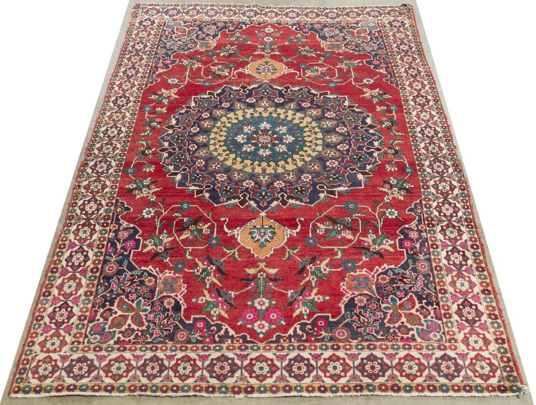HAND-TIED PERSIAN AZERBAYJAN RUG, 11'2" X 7'3": Hand-tied Persian Azerbayjan rug, holes and loss at corners, hole near one corner, thinning of pile, tears/ loss to three corners, loss to fringe, loss to edge binding, warped at one end, dye bleeding