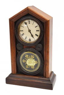 E. INGRAHAM COMPANY CONN. DORIC STYLE SHELF CLOCK: American Doric style shelf clock, late 19th c., E. Ingraham Company, Bristol, Connecticut, steeple case, glazed door with lower stenciled glass tablet, white paper dial with black roman numerals, time