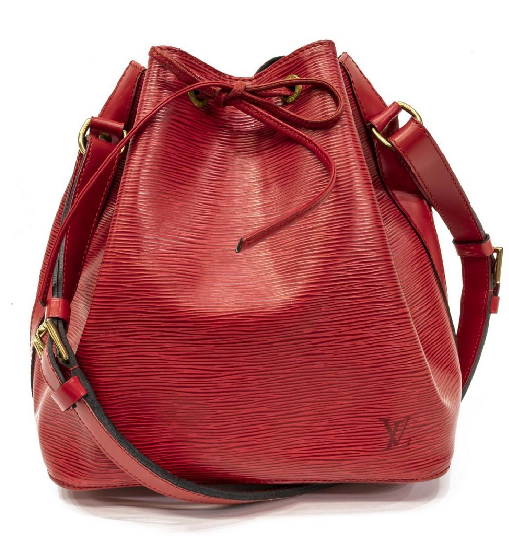 LOUIS VUITTON 'NOE' RED EPI LEATHER BUCKET BAG: Louis Vuitton "Noe" bucket bag, in red Epi leather, with brass hardware, adjustable flat shoulder strap, drawstring closure at front face, opening to black Alcantara lined interior, creasing, bag: mea