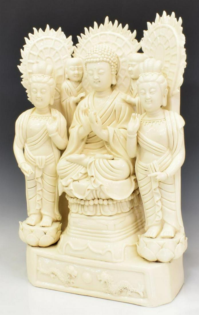 LARGE CHINESE DEHUA PORCELAIN BUDDHIST MAITREYA: Chinese Dehua porcelain (blanc de chine) Buddhist Maitreya (future Buddha), featuring seated Bodhisattva, flanked by two Arhats (saints), rising on lotus blossoms, atop rectangular base with two drago
